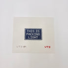 This is Packing Light Canvas - KC Needlepoint
