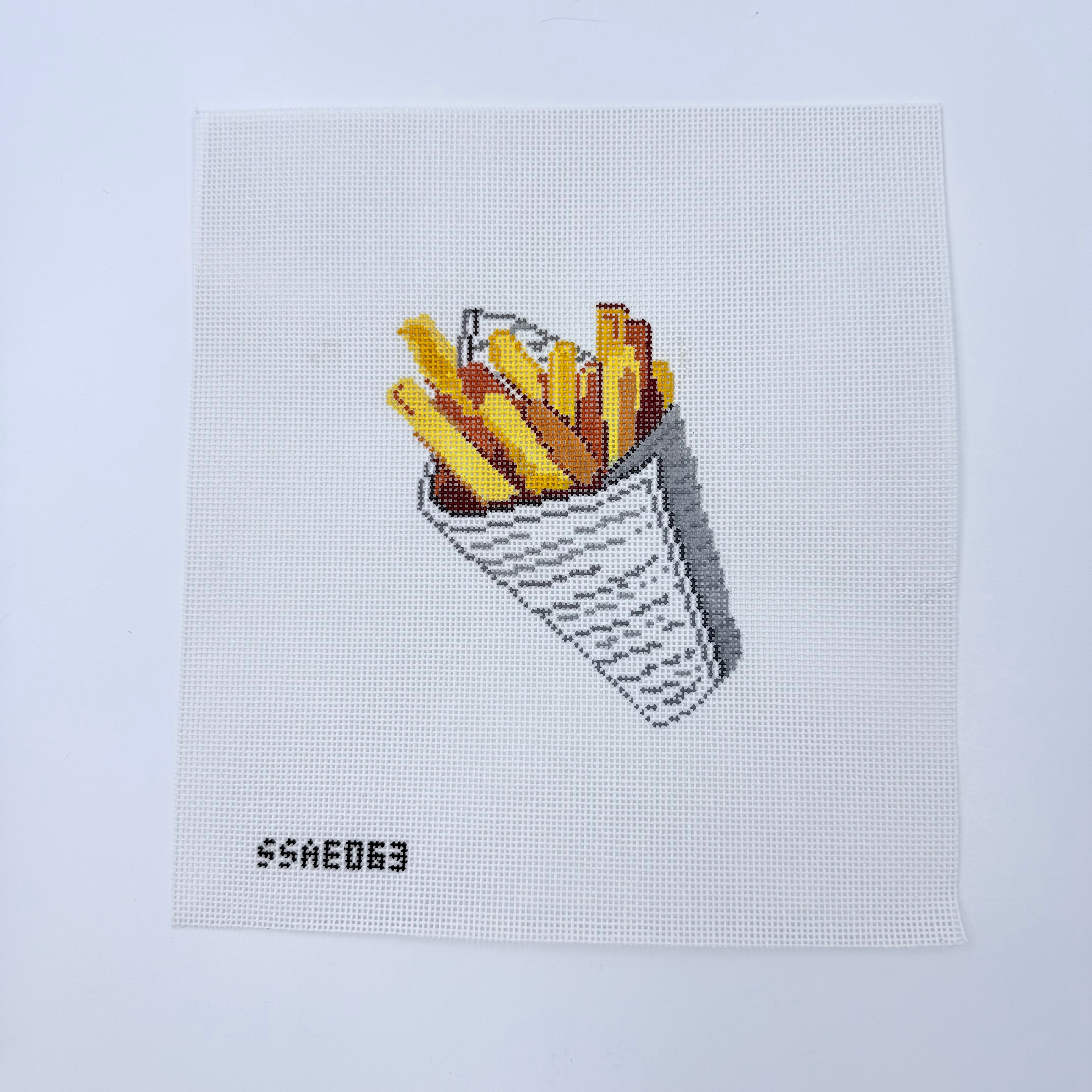 Frites in Newspaper Canvas - KC Needlepoint