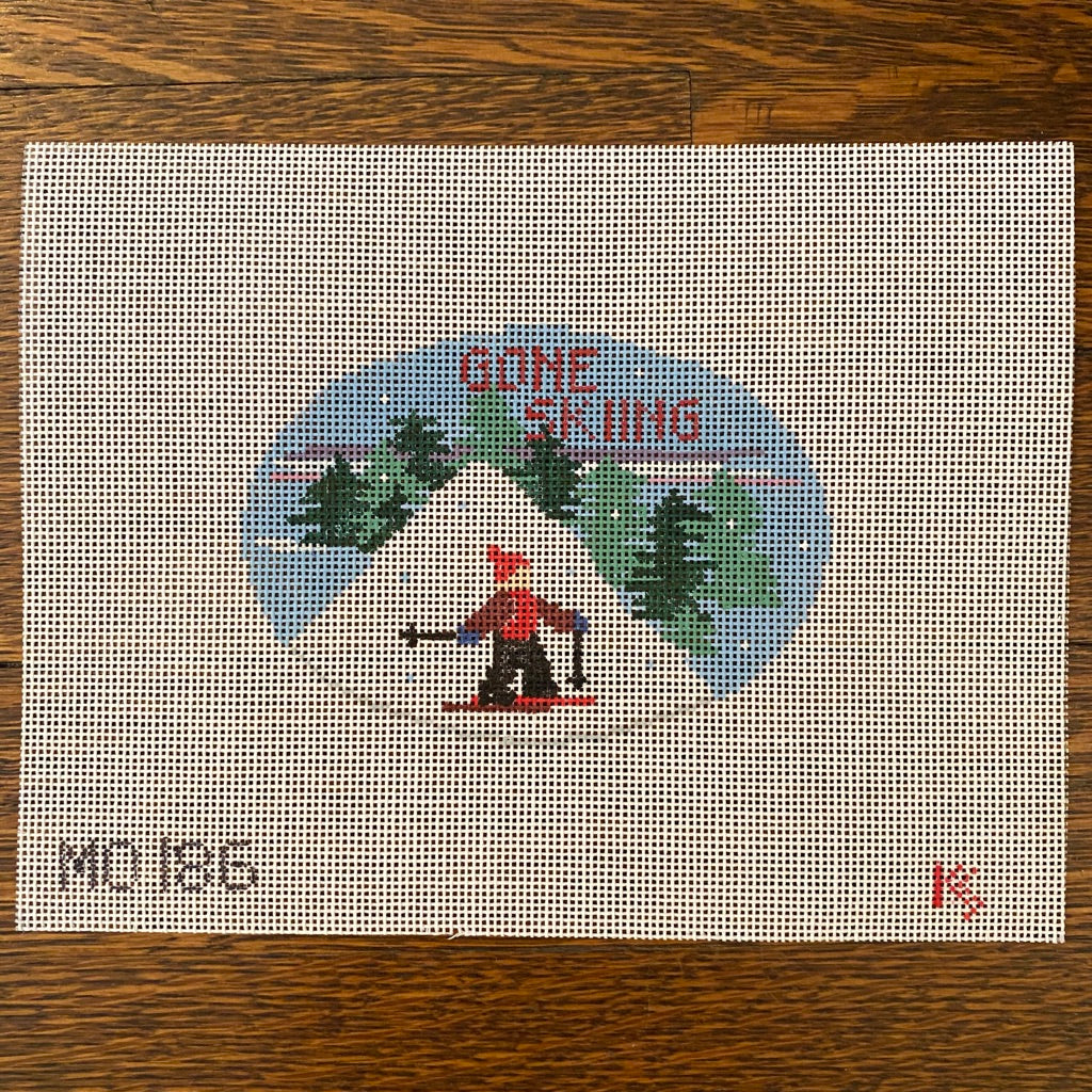 Gone Skiing Oval Canvas - needlepoint